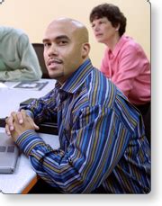 People listening to a speaker