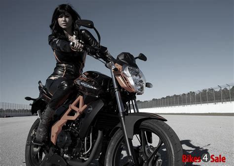 Motorcycle Girl in beautiful biker jacket. UM Xtreet 230 R Motorcycle ...