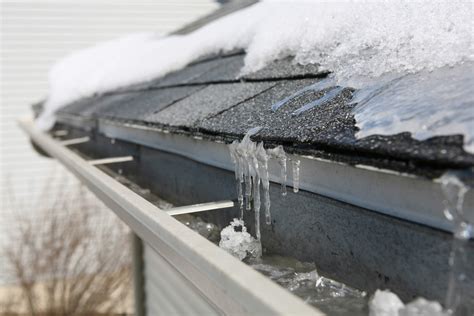 What Do Snow & Ice Do to Rain Gutters? - Holy City Gutterworks