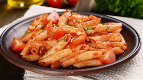 Download Penne Pasta With Red Sauce Wallpaper | Wallpapers.com