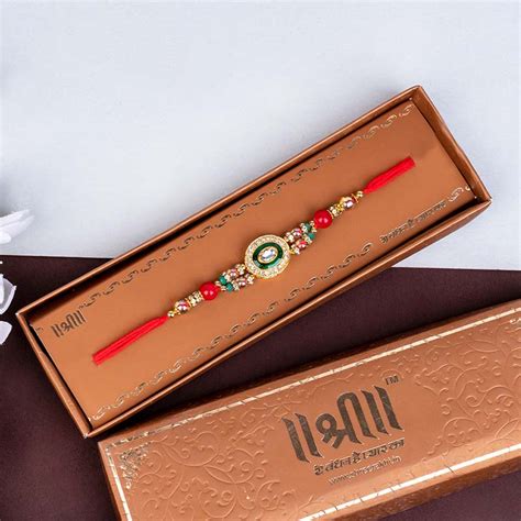 Send AD Designer Rakhi with Dry Fruits in Designer Potlis Online ...