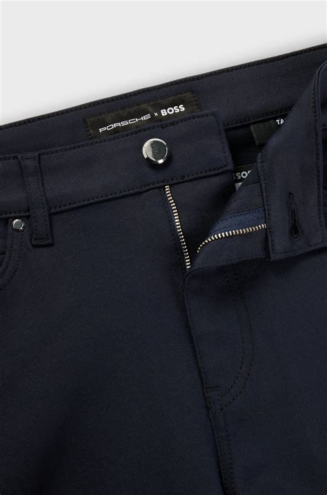 BOSS - Porsche x BOSS tapered-fit jeans in blue performance-stretch ...