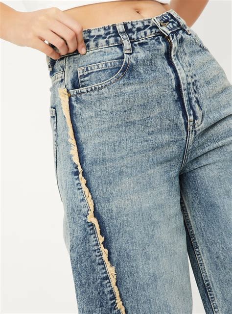 Buy Women Frayed Trim Wide Leg Jeans Online at just Rs. 1499.0 ...