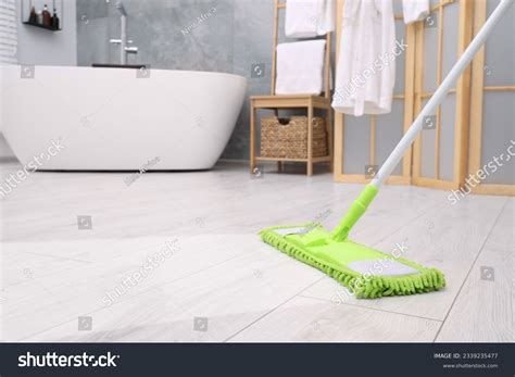Mopping Bathroom Floor