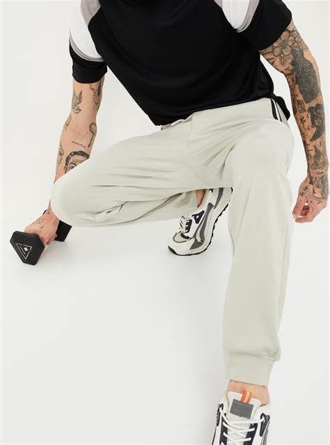 Buy Men Solid Athleisure Joggers Online at just Rs. 1199.0 ...