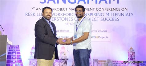 Chapter President Prasannaa S (left) handing over the prize to Abdullah ...