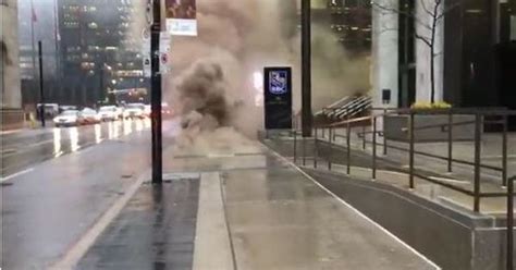 Video: Pedestrians narrowly miss blast in busy financial Toronto district