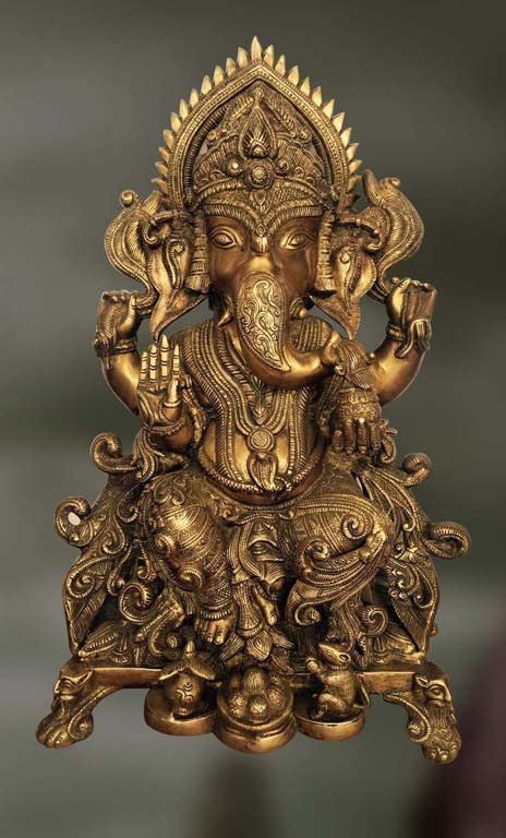 Brass Sculpture of Ganesha holding a sweet ball and blessing - Artisans ...
