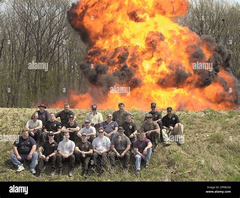 Law enforcement personnel pose for a group photo as 10 gallons of ...