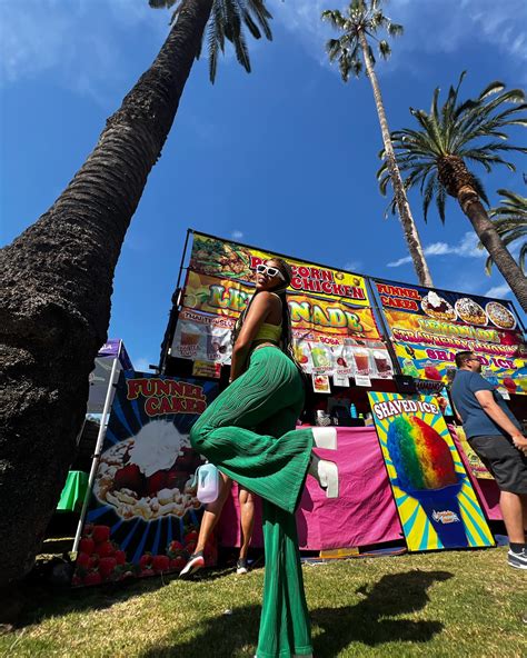 Karina Chanelle | Life Enthusiast | colors speak louder than words 💚🎡 Pants: @shein_us Hair ...