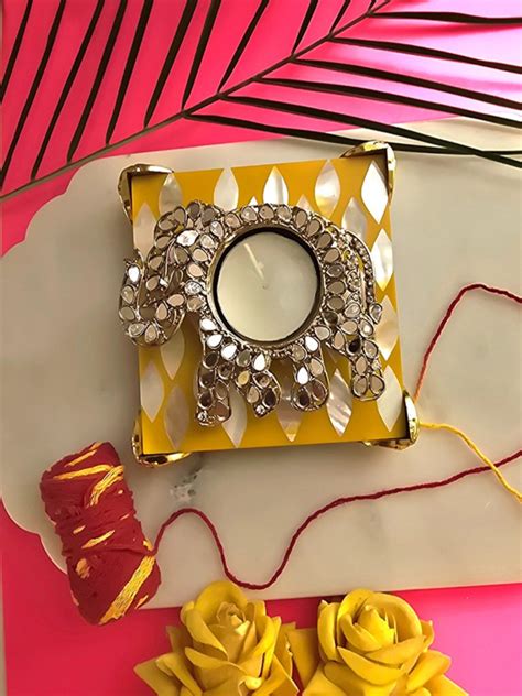 Buy Homearte Metal Elephant Shape Diya with Yellow Mop Pooja Platter ...