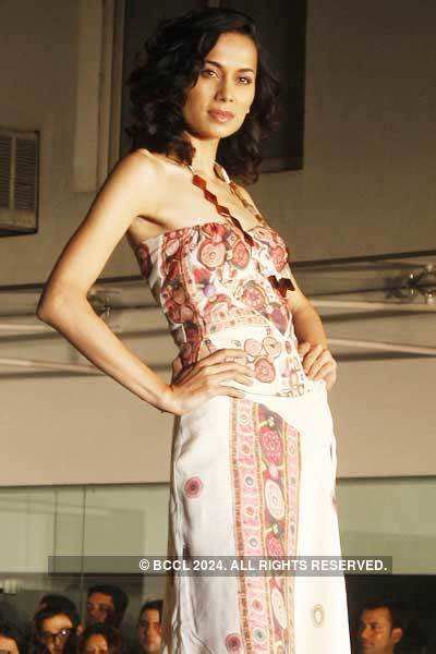 A model presents a swimwear by designer Rina Dhaka during a fashion ...