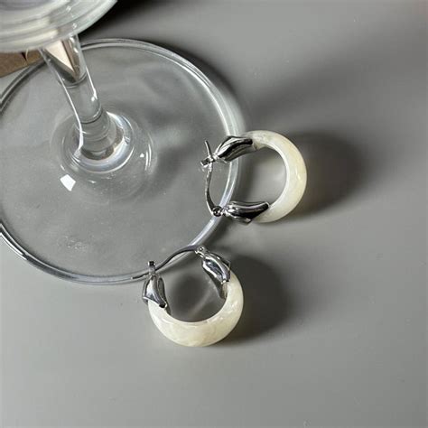 Buy Niska White Contemporary Studs Earrings Online