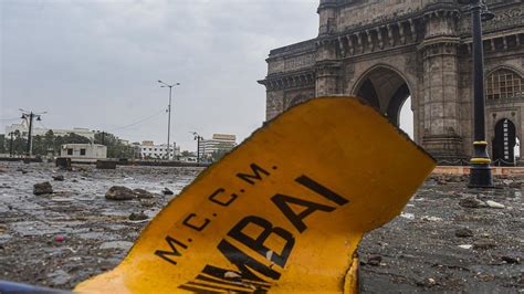 Buffeted by cyclones and floods, Mumbai enacts its very own climate ...