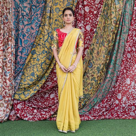 Yellow Crape Saree Set With Embroidered Floral Motifs – Aamra by Lavanya