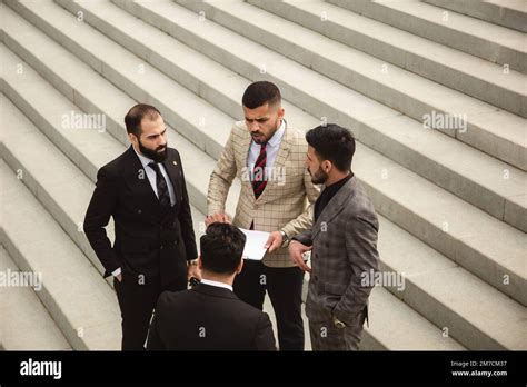 Group of Men in Suits 的图像结果