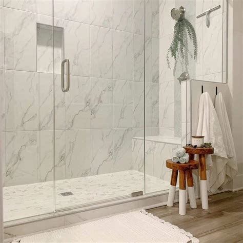 Two Stools Outside Large White Tiles on Shower Walls - Soul & Lane
