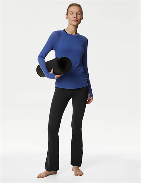 Buy High Waisted Flared Yoga Leggings at Marks & Spencer