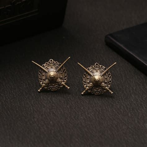 Buy Cosa Nostraa Shield & Sword Collar Tips Online