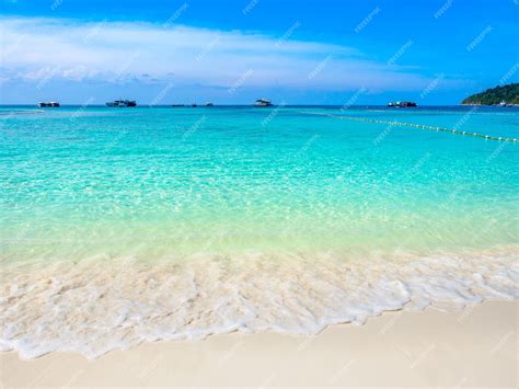 Premium Photo | Turquoise sea water and white sand beach with clear ...