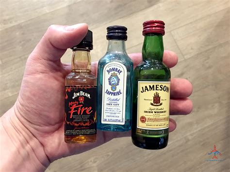 Mini-Liquor-Bottles-in-Hand-Before-Flight - Eye of the Flyer