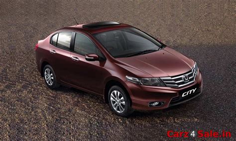 Honda City in Carnelian Red Pearl colour. Honda City V Sunroof AT Car ...