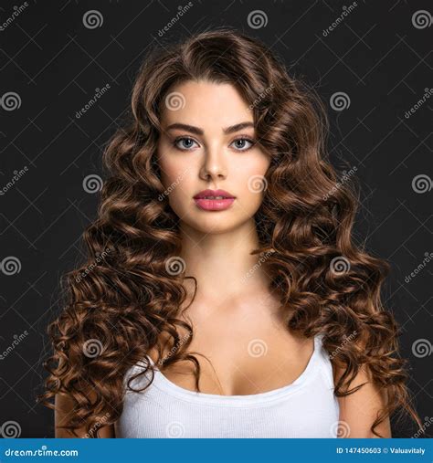 Beautiful Young Woman with Long Curly Brown Hair Stock Image - Image of ...