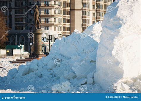 A Pile of Frozen Chunks of Snow on the Sidewalk. Destroyed New Year S Ice Slide Stock Image ...
