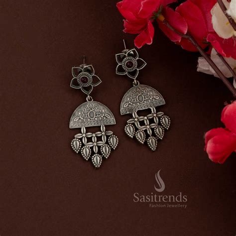 Antique Oxidised Peacock Husli Necklace with Golden Floral Pendant ...