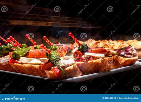 Tapas and Pinchos at a Food Market in Spain. Traditional Spanish ...