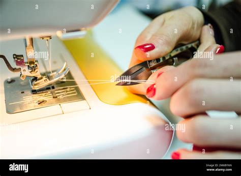 Image result for Sewing Machine Cutting Thread