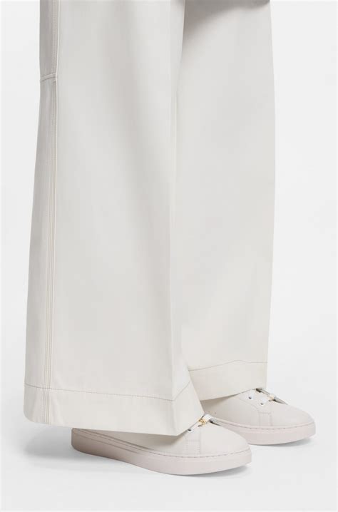 BOSS - Leather trainers with embossed logos - White