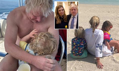 Boris Johnson hugs son on boat on holiday after 'miserable' Christmas