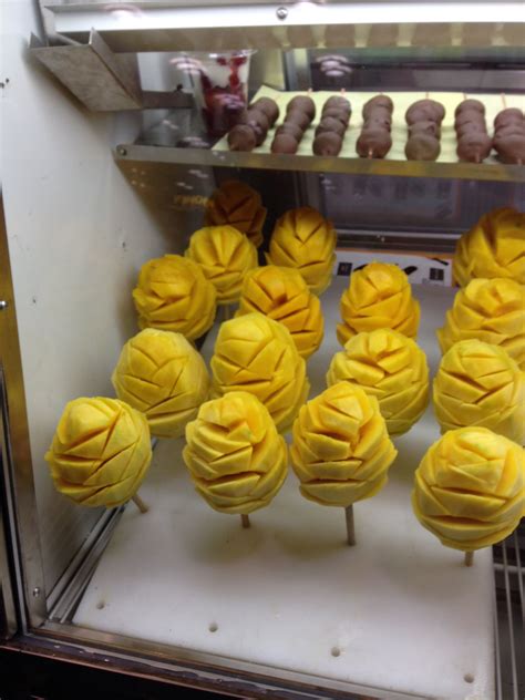 Mango on a stick | Favorite snack, Appetizers for party, International ...