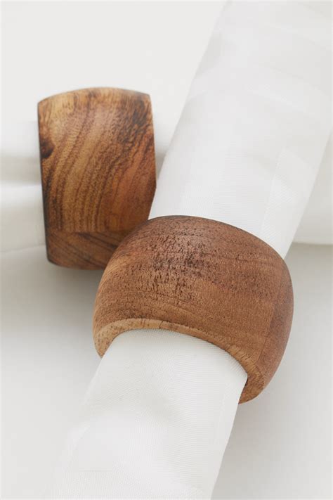 Brown 2-pack wooden napkin rings at H&M Home | H&M IN