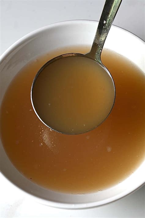 How to make beef bone broth (beef stock) by simmering bones with ...