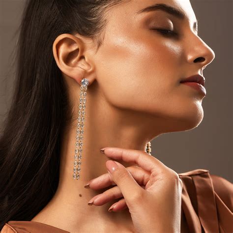 Korean Bling Golden Glitter Rainfall Earrings – VOYLLA