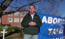 white abortion activists scream at black pro student abortion activists destroy crosses in display to remember white abortion activists scream at black pro student abortion activists destroy crosses in display to remember