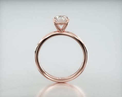 Solitaire Engagement Ring Embellished With a Classic Basket Head ...