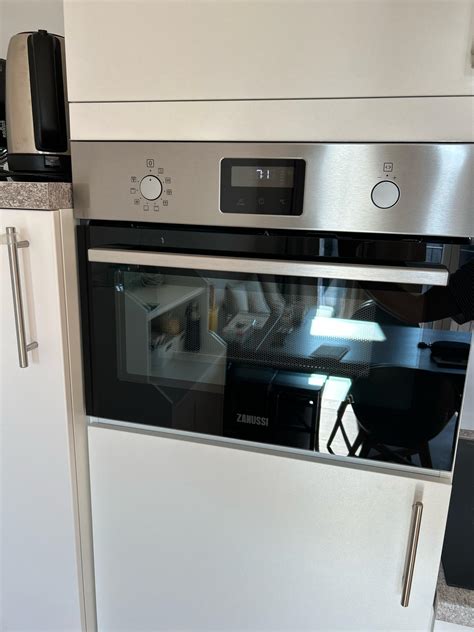Turn off clock ob Zanussi oven : r/Appliances