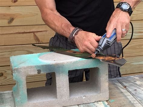 How to sharpen a lawnmower blade and clean the mower deck