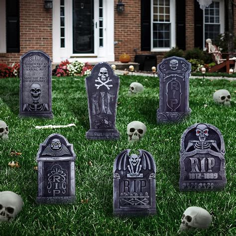 Create a creepy graveyard halloween decorations for a bone-chilling scene