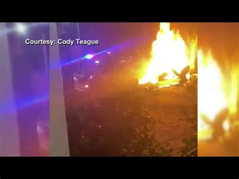 Exotic car breaks into pieces and bursts into flames after slamming ...