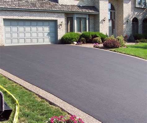 Asphalt Driveway With Concrete Border