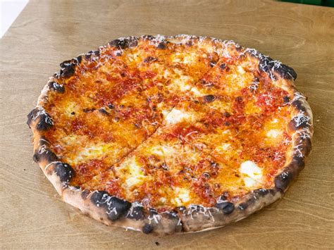 A.K. Pizza is hard to get—and even harder to beat - Review - Seattle ...