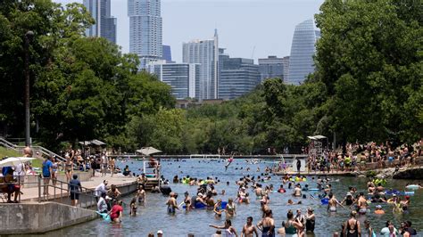 Barton Springs Pool, an Oasis Amid a Scorching Texas Summer - The New York Times