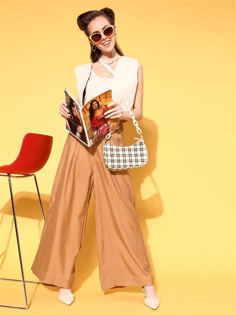 SASSAFRAS Women Chic Brown Solid Elevated Bottom Trousers - Price History