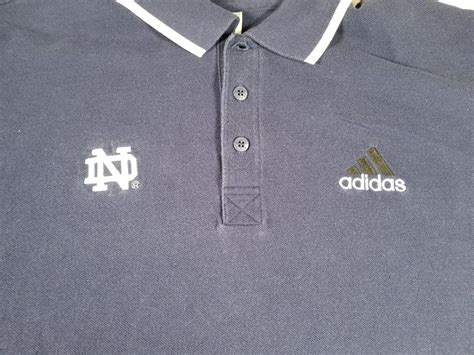 NOTRE DAME Polo Shirt Mens Large Blue FIGHTING IRISH Logo NCAA College ...