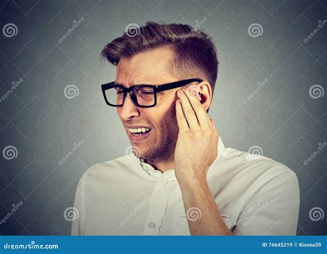 Tinnitus. Sick Man Having Ear Pain Touching Painful Head Stock Image - Image of hangover ...