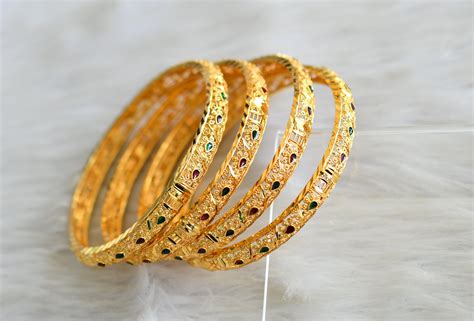 Gold tone Set of 4 designer bangles (2.8) dj-43030 – dreamjwell